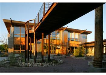 modern building with glass facade at dusk