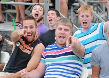 group of excited fans at an athletic event