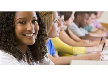 students sitting in a row during a class