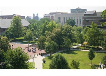 overlooking a campus quad with trees and pathways