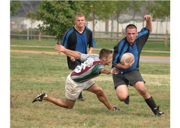 rugby players in action on the field