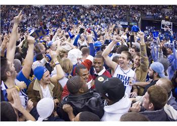 crowd of students celebrating at a sports event
