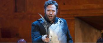 actor in costume performing on stage