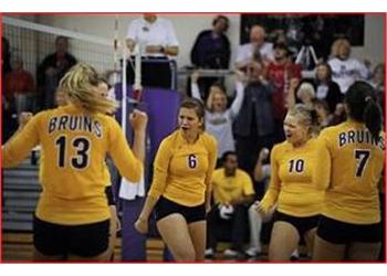 volleyball team celebrating a point