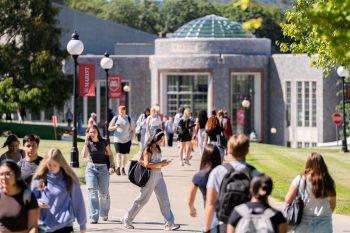 Student walking to class on campus.