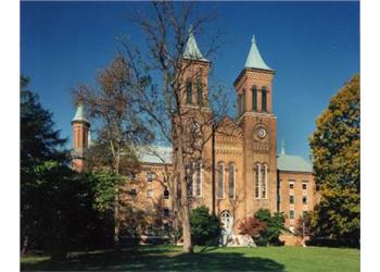 historic brick university building with towers