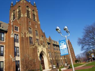 gothic architecture building with blue sign