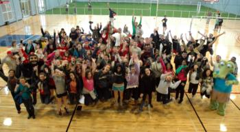 group photo of people in a gymnasium