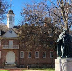 historic building and statue on campus