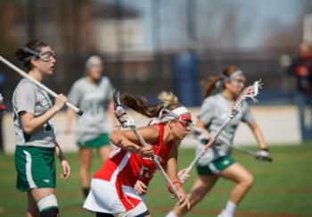 women's lacrosse game in action