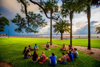 repeat - outdoor group meeting on campus lawn