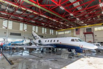 jet aircraft in a maintenance hangar